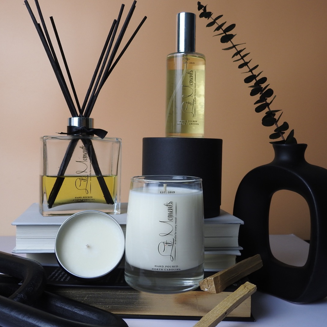A Lit Moments Candle Company reed diffuser, with stylish reeds and a glass bottle, offering a continuous and subtle fragrance for your home.