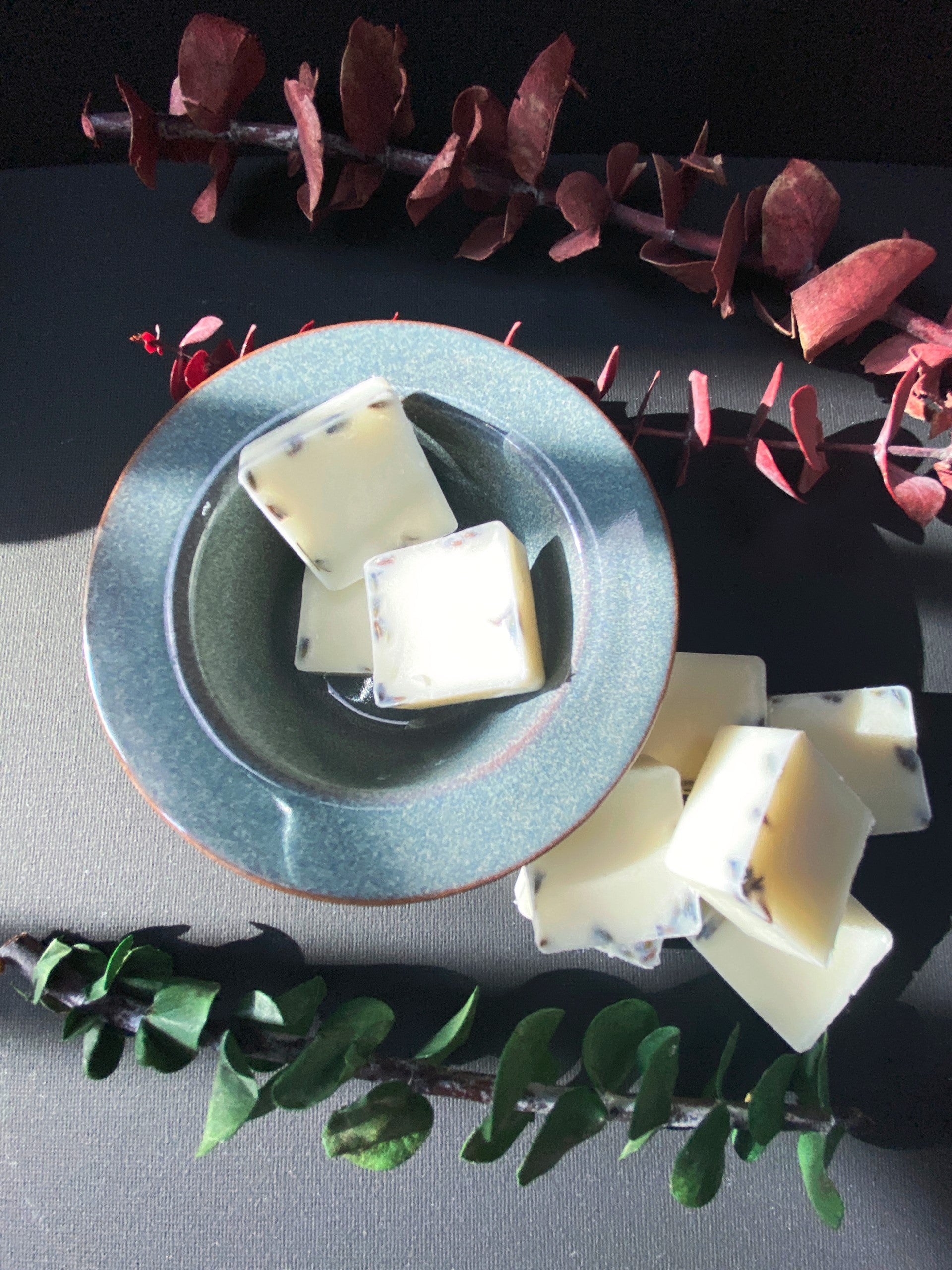 Lit Moments Candle Company's fall candle collection, showcasing warm, earthy tones and inviting fragrances, ideal for seasonal ambiance."